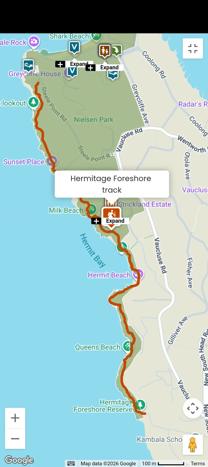 Map showing the coastal Hermitage Foreshore track winding along beaches from Shark Beach to Hermitage Foreshore Reserve, with marked lookouts, facilities, and nearby parks including Nielsen Park.