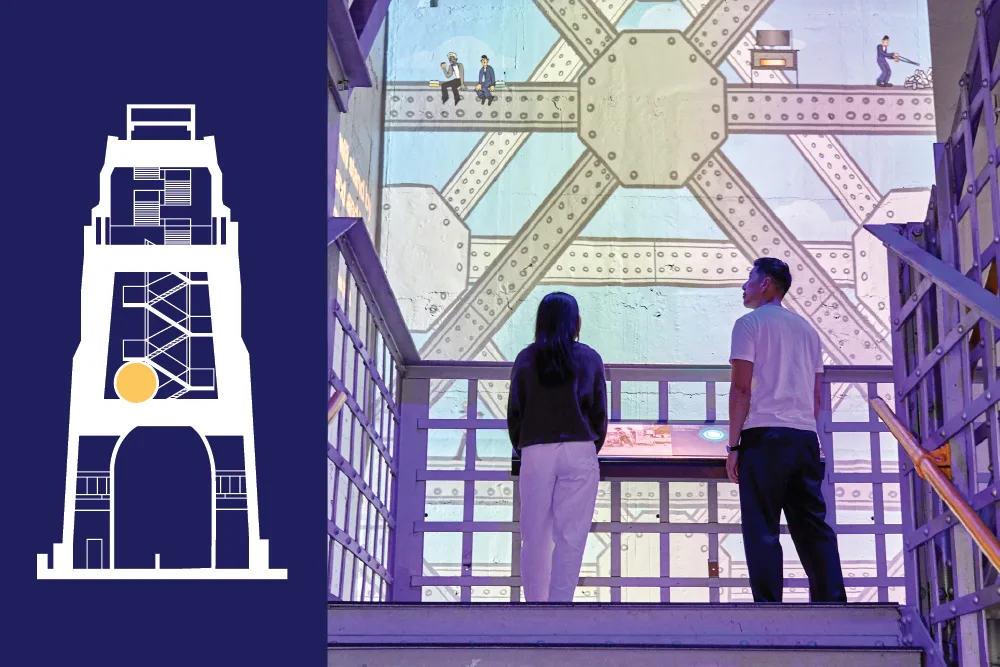 Two visitors view the Sydney Harbour Bridge's steel structure from an interior walkway, with a cross-section diagram showing the bridge's internal framework and observation levels.