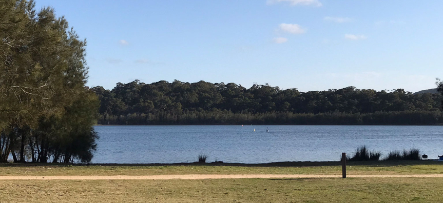 View across Narrabeen Lagoon from Bilarong Reserve, North Narrabeen.